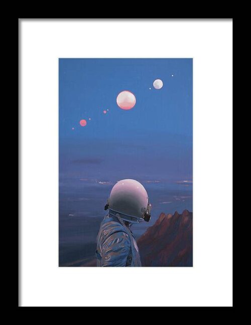 Moons Framed Print